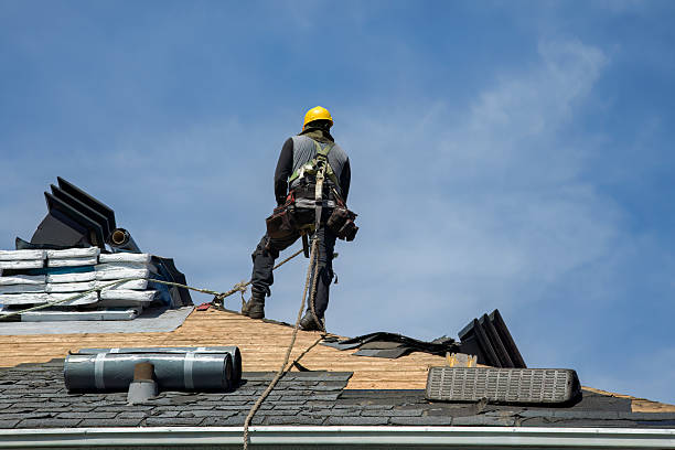 Professional Storm Damage Roof Repair technician working in Melville, RI